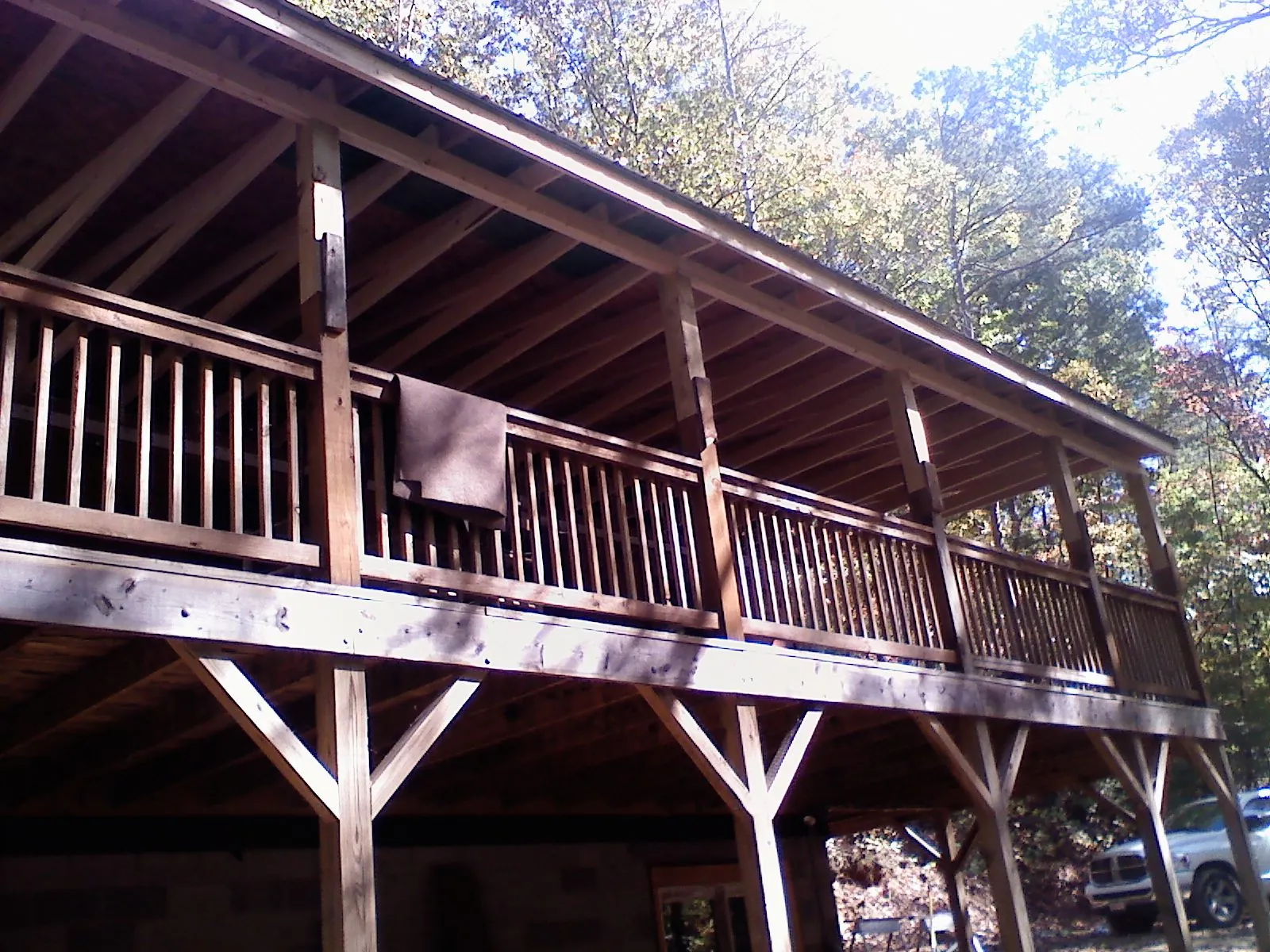 Timber framing under a new elevated porch and deck — Roof Leak Repair in Sweeny by Roofing Brothers